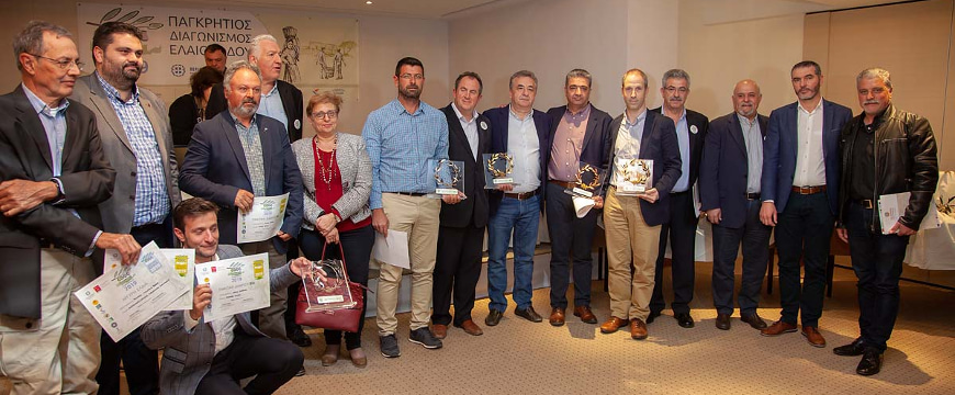 Cretan Olive Oil Competition winners lined up together with their awards