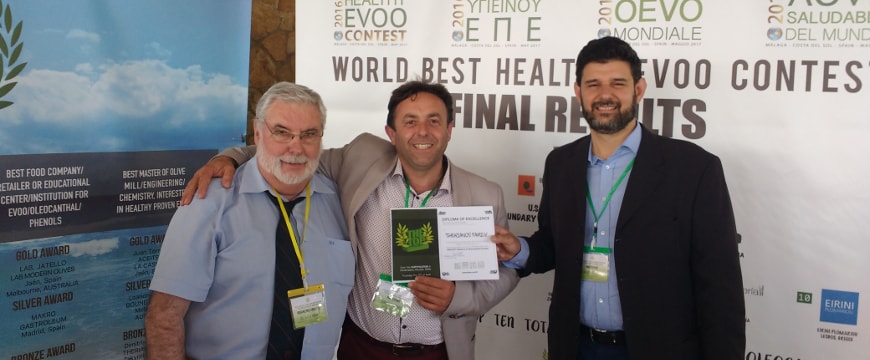 Jose Amerigo, Dimitris Therianos, and Prokopios Magiatis with Therianos award in Malaga