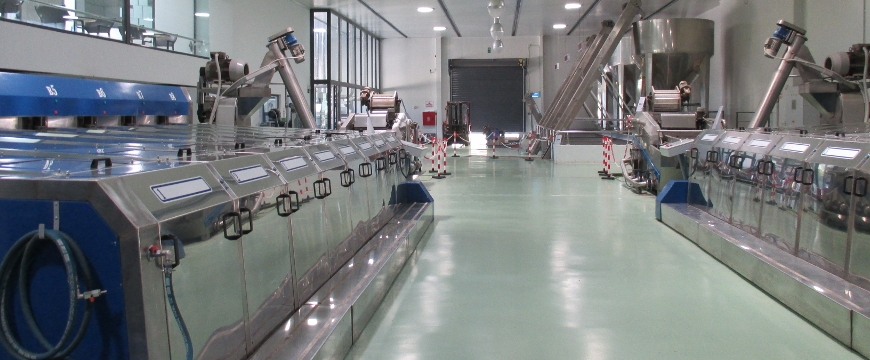 stainless steel machinery inside Terra Creta's olive mill