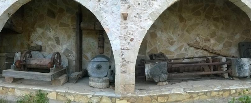 Old machinery in two arched alcoves at Anoskeli