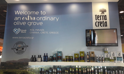 the wall of the Terra Creta booth at SIAL Paris, with their motto, products, and SIAL Innovation finalist notice
