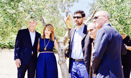 Dan Flynn, Eleni Melliou, and others at olive tree adoption by the Acropolis