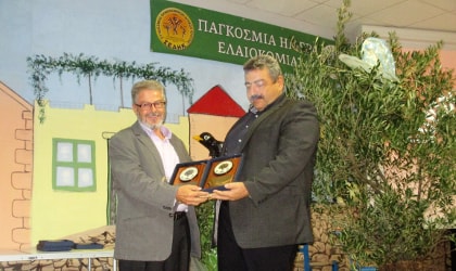 Agricultural Cooperative of Kritsa chairperson accepting an award