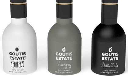 Three different bottles of Goutis Estate olive oil