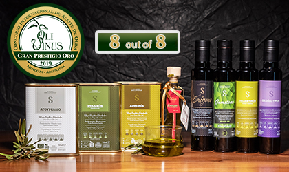 Sakellaropoulos Organic Farming's 8 award-winning products lined up in a row, with the Olivinus logo and "8 out of 8" above them