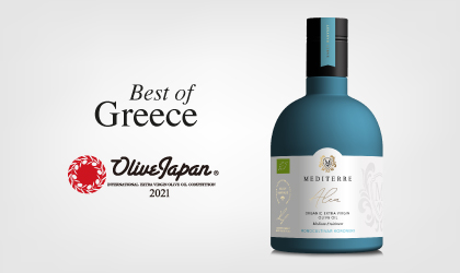A bottle of Mediterre Alea olive oil on the right, and the words "Best of Greece" and "Olive Japan" to the left of it, with the competition logo
