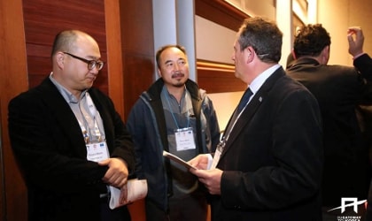 Emmanouil Karpadakis meeting with two Korean businesspeople