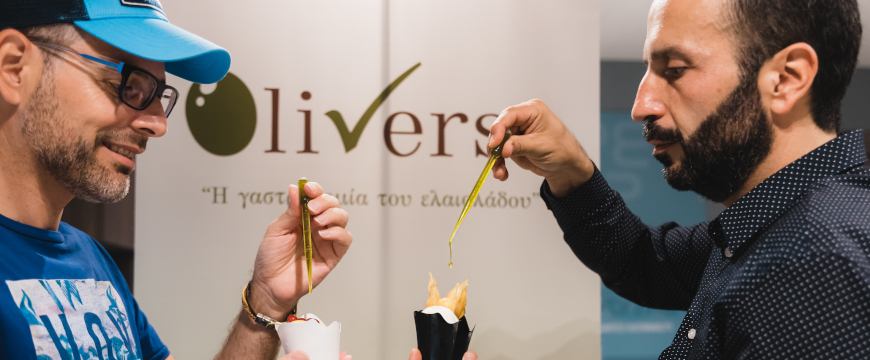 The Oliverse duo adding olive oil from droppers to food