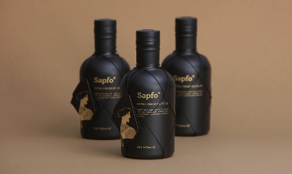 3 black Sapfo olive oil bottles, one in front of the other two