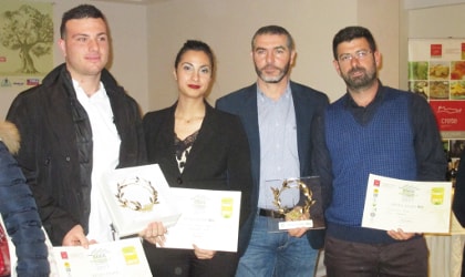 Winners of gold awards at the Cretan Olive Oil Competition with the president of the Agronutritional Cooperation of Crete