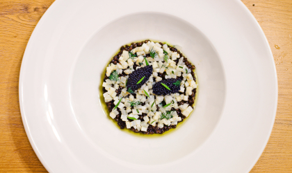 Lentils, cuttlefish, and caviar dish by Vassilis Alexiou