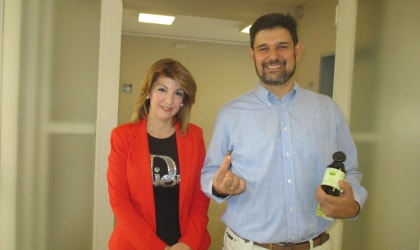 Dr. Prokopios Magiatis & Dr. Eleni Melliou with Olea Health capsules 