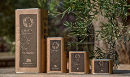 Four tins of Sparta Groves olive oil in a row, with the largest on the left and the smallest on the right