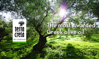a Terra Creta olive grove with the Terra Creta logo on the left and on the right the words "The most awarded Greek olive oil"