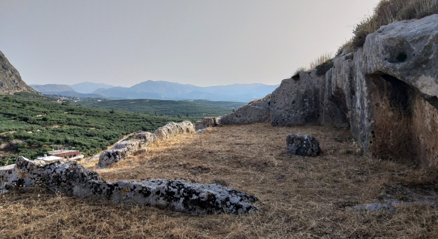 the flat area in front of the cave room and its panoramic view of olive groves and hills