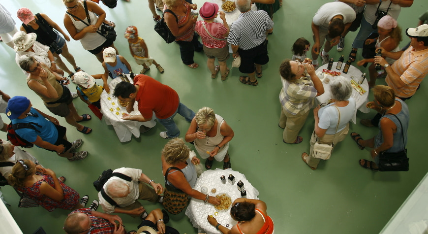 tourists tasting Terra Creta products, viewed from above